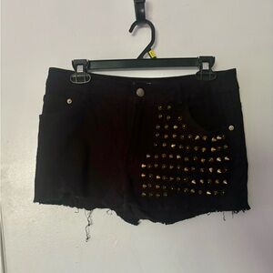 High-waisted black denim shorts with gold studs tumblr pastel grunge alternative
